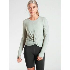 Athleta women’s oga shirt sie XXS long sleeve green, knotted front, thumb holes
